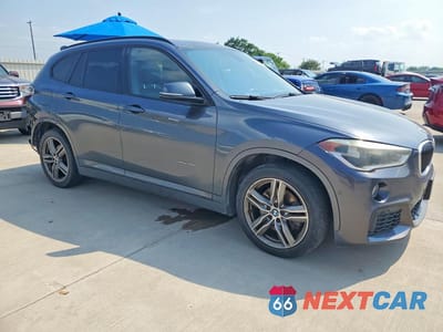 Czwarte zdjęcie samochodu z boku: 2016 BMW X1 XDRIVE28I VIN:WBXHT3C37GP887697 - miniatura