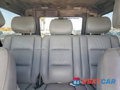 Zdjęcie 10 z 13 samochodu: 2002 MERCEDES-BENZ G 500 BRABUS VIN:WDCYR49E62X128102 - miniatura