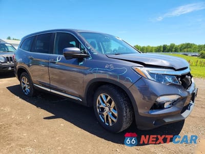 Czwarte zdjęcie samochodu z boku: 2018 HONDA PILOT EXL VIN:5FNYF6H54JB008299 - miniatura