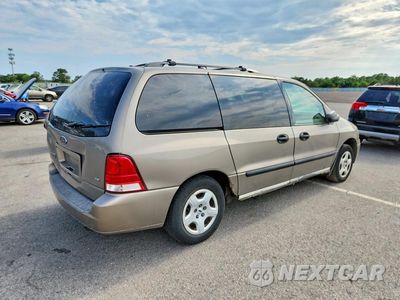 Trzecie zdjęcie samochodu z tyłu: 2004 FORD FREESTAR SE VIN:2FMZA51664BB18798 - miniatura