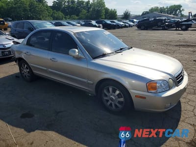 Czwarte zdjęcie samochodu z boku: 2004 KIA OPTIMA LX V6 VIN:KNAGD128145320414 - miniatura