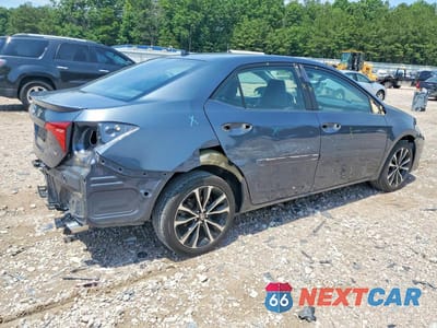 Trzecie zdjęcie samochodu z tyłu: 2017 TOYOTA COROLLA SE VIN:5YFBURHE5HP677192 - miniatura