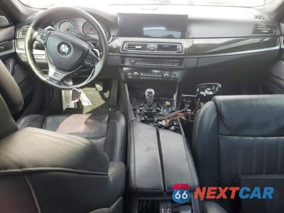 Zdjęcie 8 z 12 samochodu: 2013 BMW M5 VIN:WBSFV9C52DC774089 - miniatura