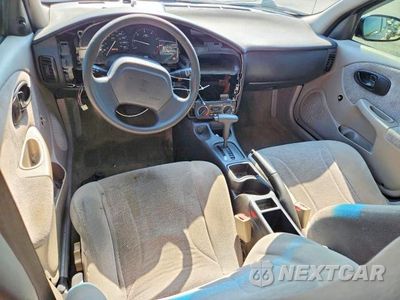 Zdjęcie 7 z 13 samochodu: 2002 SATURN SL1 VIN:XG8ZH52842Z312766 - miniatura