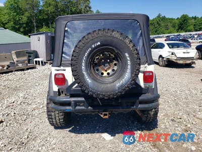 Zdjęcie 6 z 12 samochodu: 1998 JEEP WRANGLER VIN:1J4FY29P5WP765620 - miniatura