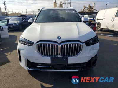 Piąte zdjęcie samochodu w środku: 2025 BMW X5 XDRIVE50E VIN:5UX43EU0XS9Y04268 - miniatura