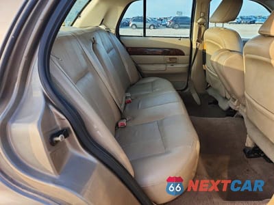 Zdjęcie 10 z 12 samochodu: 2004 MERCURY GRAND MARQUIS LS VIN:2MEFM75W54X656611 - miniatura