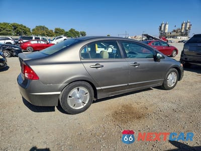Trzecie zdjęcie samochodu z tyłu: 2006 HONDA CIVIC HYBRID VIN:JHMFA36266S004020 - miniatura