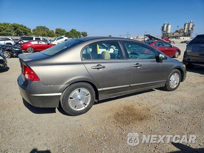 Trzecie zdjęcie samochodu z tyłu: 2006 HONDA CIVIC HYBRID VIN:JHMFA36266S004020 - miniatura