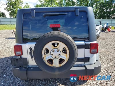 Zdjęcie 6 z 13 samochodu: 2011 JEEP WRANGLER SPORT VIN:1J4AA2D11BL609089 - miniatura