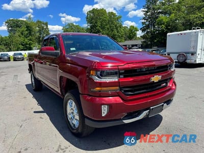 Czwarte zdjęcie samochodu z boku: 2017 CHEVROLET SILVERADO K1500 LT VIN:1GCVKREC7HZ117671 - miniatura