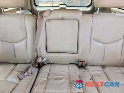 Zdjęcie 10 z 13 samochodu: 2003 GMC YUKON VIN:1GKEK13Z93J118633 - miniatura