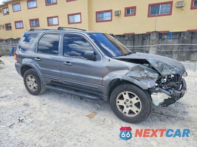 Czwarte zdjęcie samochodu z boku: 2005 FORD ESCAPE LIMITED VIN:1FMCU041X5KD13679 - miniatura