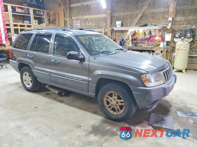 Czwarte zdjęcie samochodu z boku: 2004 JEEP GRAND CHEROKEE LAREDO VIN:1J4GX48S54C427972 - miniatura