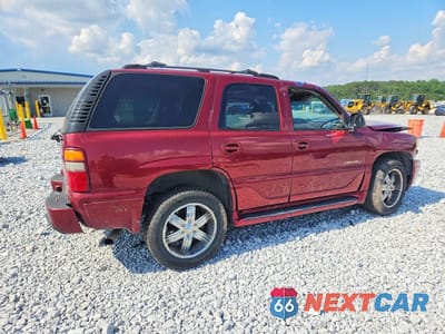 Trzecie zdjęcie samochodu z tyłu: 2003 GMC YUKON DENALI VIN:1GKEK63U13J246236 - miniatura