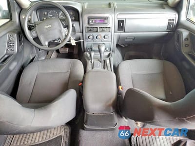 Zdjęcie 8 z 13 samochodu: 2004 JEEP GRAND CHEROKEE LAREDO VIN:1J4GW48N04C373591 - miniatura