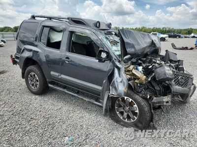 Czwarte zdjęcie samochodu z boku: 2014 NISSAN XTERRA PRO-4X VIN:5N1AN0NW8EN807276 - miniatura