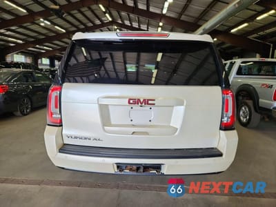 Zdjęcie 6 z 13 samochodu: 2015 GMC YUKON XL K1500 SLT VIN:1GKS2HKC4FR531199 - miniatura