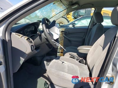 Zdjęcie 7 z 12 samochodu: 2002 FORD FOCUS SE VIN:1FAFP36302W255875 - miniatura