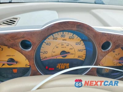 Zdjęcie 9 z 13 samochodu: 2003 NISSAN MURANO SL VIN:JN8AZ08W53W209825 - miniatura