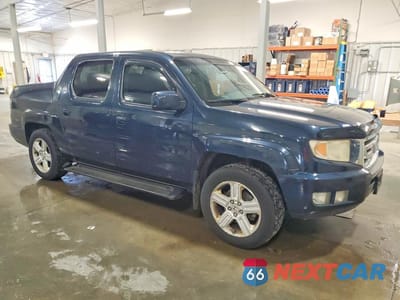 Czwarte zdjęcie samochodu z boku: 2009 HONDA RIDGELINE RTL VIN:2HJYK16559H500732 - miniatura