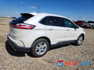 Trzecie zdjęcie samochodu z tyłu: 2019 FORD EDGE SEL VIN:2FMPK3J9XKBB87686 - miniatura