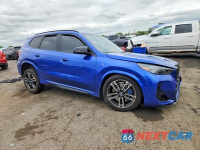 Czwarte zdjęcie samochodu z boku: 2024 BMW X1 M35I VIN:WBX13EF0XR5Y16605 - miniatura