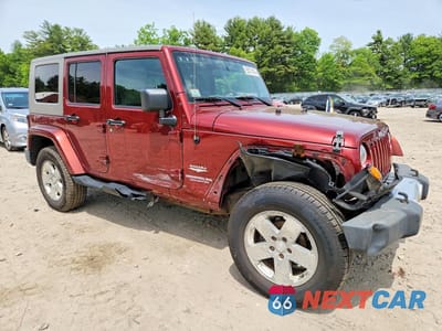 Czwarte zdjęcie samochodu z boku: 2010 JEEP WRANGLER UNLIMITED SAHARA VIN:1J4BA5H13AL111071 - miniatura
