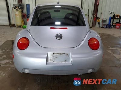 Zdjęcie 6 z 12 samochodu: 2001 VOLKSWAGEN NEW BEETLE GL VIN:3VWBS21C71M416470 - miniatura