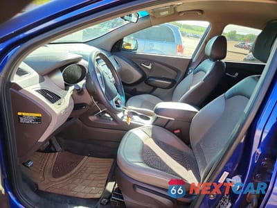 Zdjęcie 7 z 12 samochodu: 2013 HYUNDAI TUCSON GLS VIN:KM8JUCAC6DU629369 - miniatura