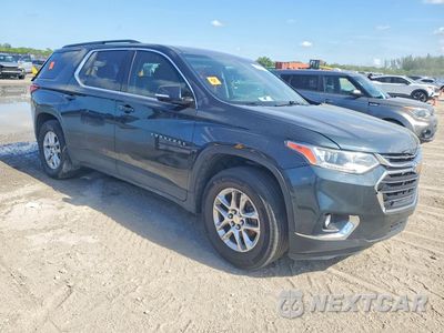 Czwarte zdjęcie samochodu z boku: 2019 CHEVROLET TRAVERSE LT VIN:1GNERGKW0KJ264233 - miniatura