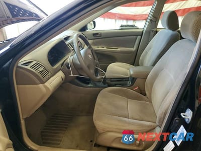 Zdjęcie 7 z 12 samochodu: 2003 TOYOTA CAMRY LE VIN:4T1BE32K13U200646 - miniatura