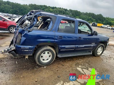 Trzecie zdjęcie samochodu z tyłu: 2002 GMC YUKON VIN:1GKEC13Z92R196410 - miniatura