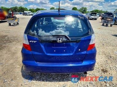 Zdjęcie 6 z 12 samochodu: 2010 HONDA FIT VIN:JHMGE8G2XAS000095 - miniatura