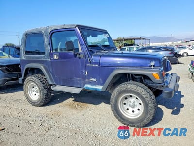 Czwarte zdjęcie samochodu z boku: 1999 JEEP WRANGLER VIN:1J4FY29P2XP472503 - miniatura