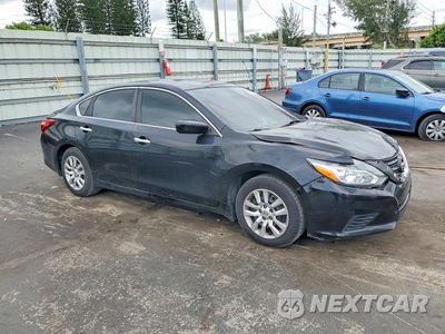 Czwarte zdjęcie samochodu z boku: 2014 NISSAN ALTIMA 2.5 S VIN:1N4AL3AP1GN320939 - miniatura