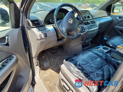 Zdjęcie 8 z 12 samochodu: 2010 HONDA ODYSSEY EXL VIN:5FNRL3H79AB024575 - miniatura