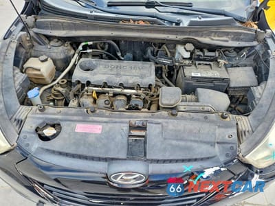Zdjęcie 12 z 13 samochodu: 2012 HYUNDAI TUCSON GLS VIN:KM8JU3AC6CU360739 - miniatura