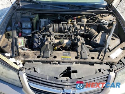 Zdjęcie 11 z 12 samochodu: 2002 CHEVROLET IMPALA VIN:2G1WF55K229180311 - miniatura
