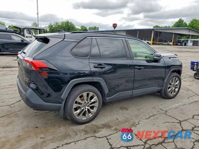Trzecie zdjęcie samochodu z tyłu: 2019 TOYOTA RAV4 XLE PREMIUM VIN:JTMA1RFV3KJ003075 - miniatura