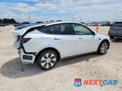 Trzecie zdjęcie samochodu z tyłu: 2023 TESLA MODEL Y VIN:7SAYGDEE8PA067824 - miniatura