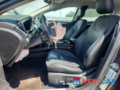 Zdjęcie 7 z 12 samochodu: 2014 FORD FUSION TITANIUM VIN:3FA6P0K97ER244582 - miniatura