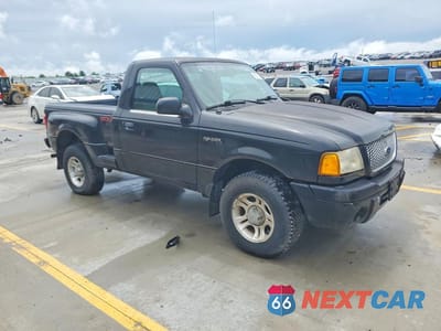 Czwarte zdjęcie samochodu z boku: 2001 FORD RANGER VIN:1FTYR10E01TA63769 - miniatura