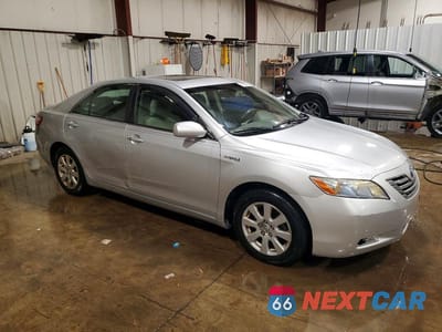 Czwarte zdjęcie samochodu z boku: 2007 TOYOTA CAMRY HYBRID VIN:JTNBB46K973038690 - miniatura