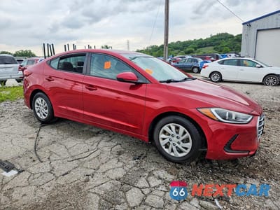 Czwarte zdjęcie samochodu z boku: 2018 HYUNDAI ELANTRA SE VIN:KMHD74LFXJU453911 - miniatura