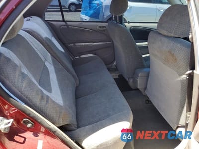 Zdjęcie 10 z 13 samochodu: 2000 TOYOTA COROLLA VE VIN:1NXBR12E3YZ350557 - miniatura