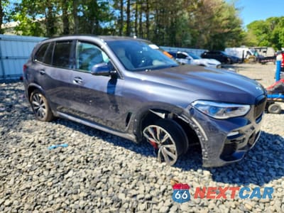 Czwarte zdjęcie samochodu z boku: 2021 BMW X5 XDRIVE40I VIN:5UXCR6C09M9F66923 - miniatura