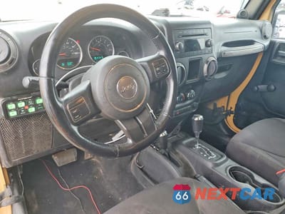 Zdjęcie 8 z 13 samochodu: 2013 JEEP WRANGLER SPORT VIN:1C4AJWAGXDL686939 - miniatura