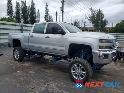 Czwarte zdjęcie samochodu z boku: 2015 CHEVROLET SILVERADO K2500 HEAVY DUTY LTZ VIN:1GC1KWE83FF172786 - miniatura