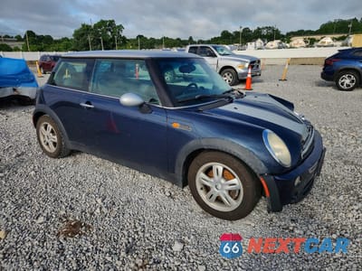 Czwarte zdjęcie samochodu z boku: 2006 MINI COOPER VIN:WMWRC33556TJ75954 - miniatura